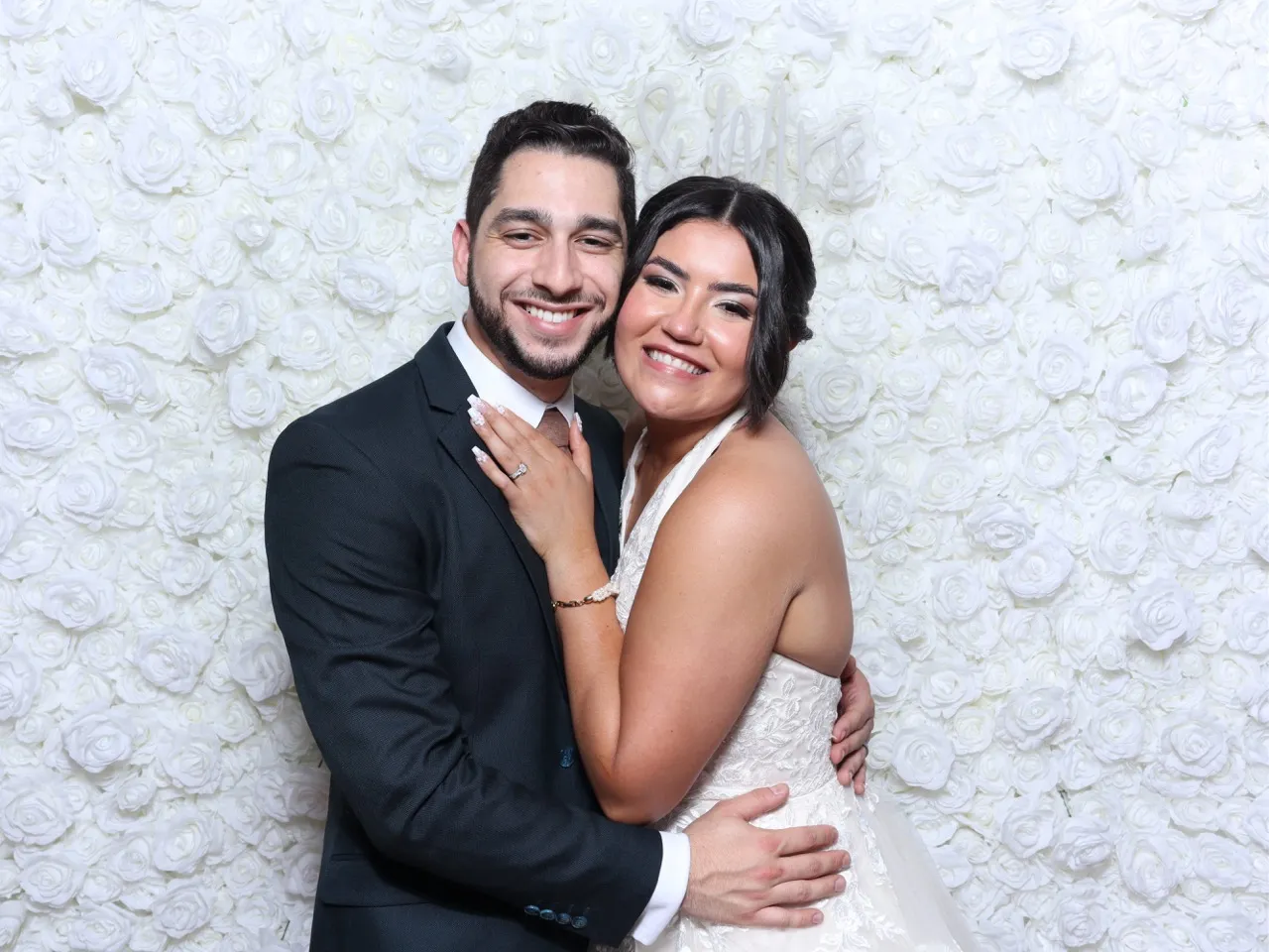 Wedding couple using Golden Clicks Orlando photo booth