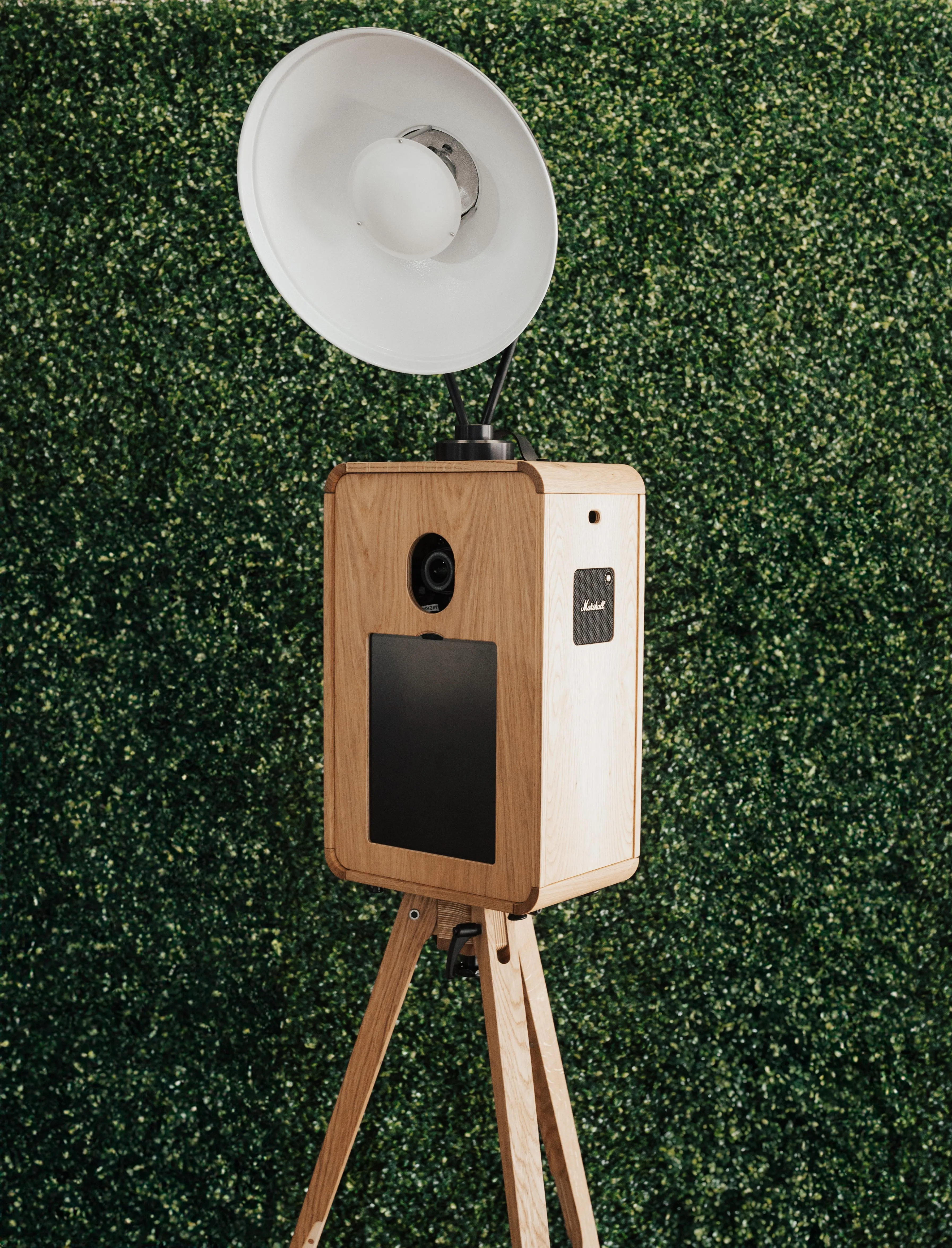 Green hedge luxe wall backdrop for Orlando photo booth